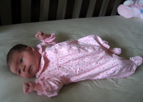 Relaxing in my Crib - Two Weeks Old