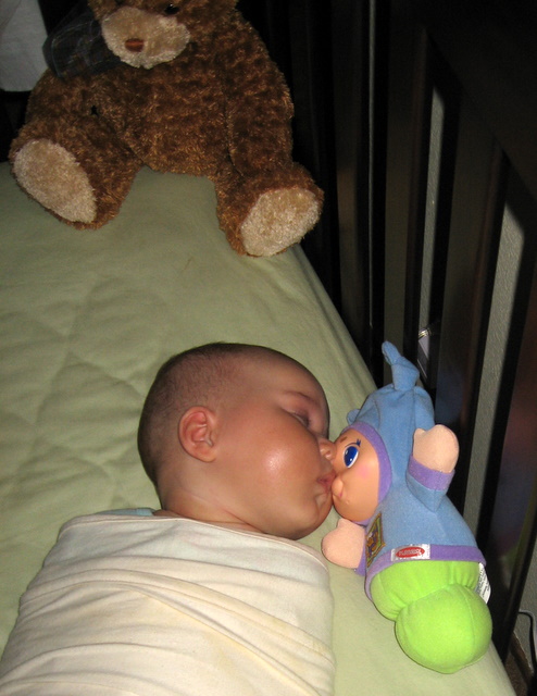 Ari kissing sleepytime buddy